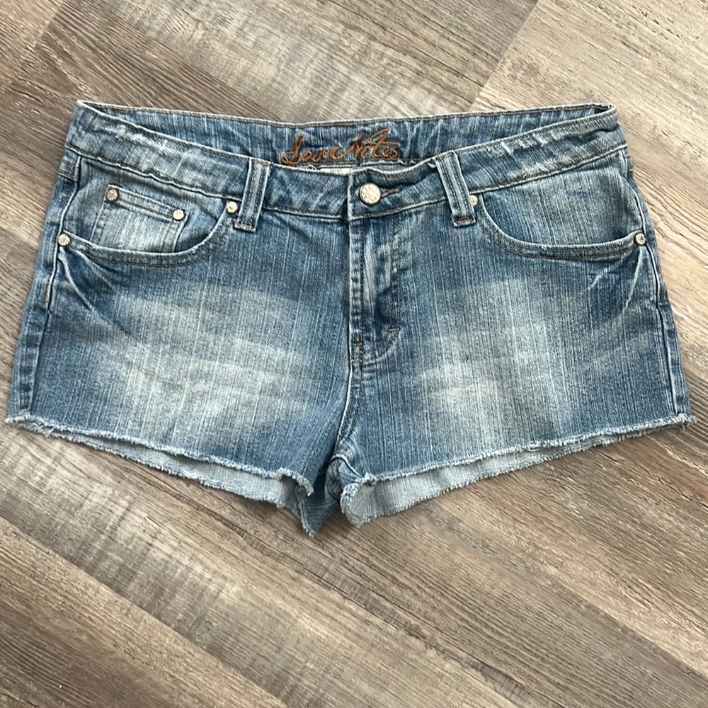 Denim shorts Raw Hem 5 Pockets Embroidered Pockets Distressed size 11/12
